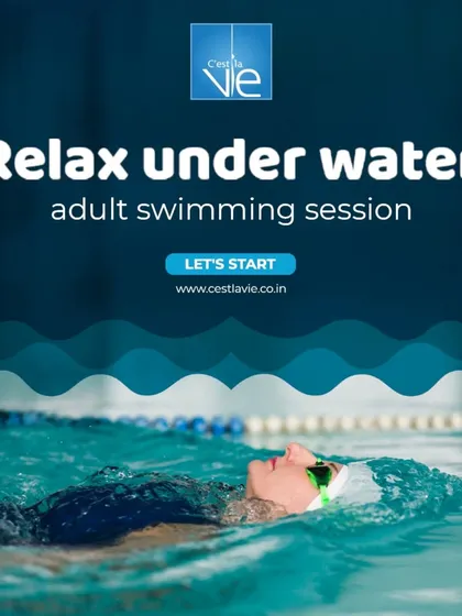 Our adult swimming sessions are designed for both fitness and relaxation. Here, a swimmer enjoys a quiet backstroke, demonstrating the meditative quality of moving through the water.