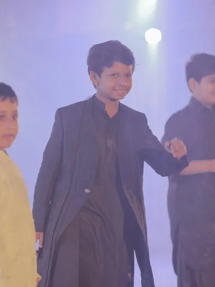 The boys' squad bringing their best moves to the sangeet stage. We love working with kids to create energetic and fun wedding performances that let their personalities shine.