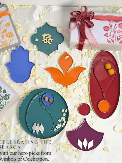 Here are our hero picks from the Symbols of Celebration collection, laid out like a festive map. Each shape, from the Bindu to the Pushpa tray, is rooted in tradition and designed in vibrant color to make your gatherings truly memorable.