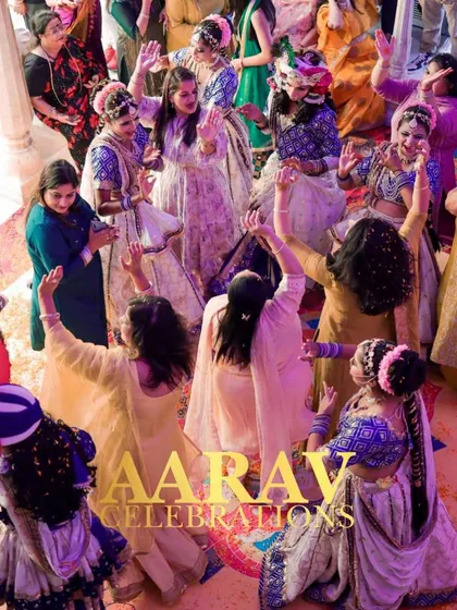 The energy is palpable as guests raise their hands and dance with the Raasleela performers. This is what a truly successful themed event looks like, full of participation and happiness.