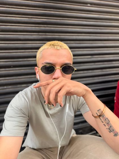 A quiet moment, listening to music with my headphones in. This is me in my own world, constantly analyzing sounds and finding inspiration for my next track or DJ set.