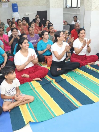 The happy faces of our participants after a fulfilling yoga session. The smiles and applause reflect the joy and sense of community that we cultivate in our studio classes.