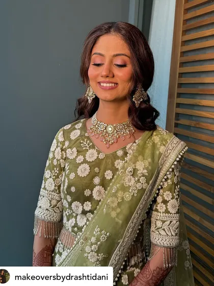 A close-up of the eye makeup, showing the soft, blended eyeshadow. The goal was to define her eyes while keeping the overall look natural and elegant for a daytime ceremony.