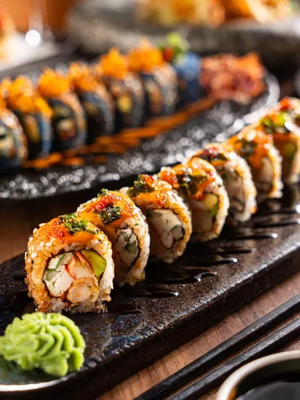 Precision and artistry in a single frame. This close-up on a sushi platter highlights the fresh ingredients and meticulous preparation, creating a clean, high-end visual perfect for a restaurant menu or social media feature.