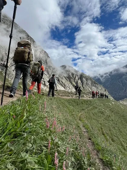 Our group from Thailand on the move, trekking through the beautiful flowery meadows of the Hampta valley.