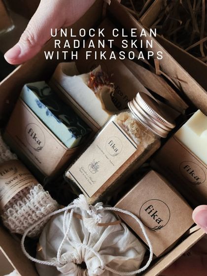 Unlocking clean, radiant skin is easy with my curated gift boxes. This box is packed with a variety of my handcrafted soaps, bath salts in a glass jar, and a soap saver pouch, offering a complete and nourishing skincare experience.