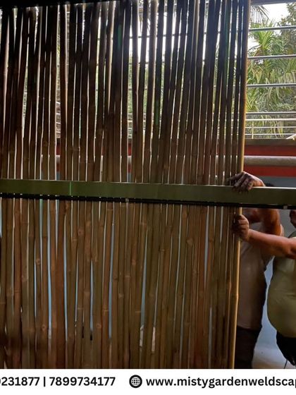 Our team installing the bamboo walls for the farmhouse structure. We use high-quality, treated bamboo to ensure durability and longevity.