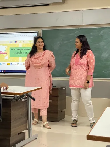 Leading a workshop session with a colleague. We often collaborate with other experts to bring diverse perspectives to our training programs, enriching the learning experience for all participants.