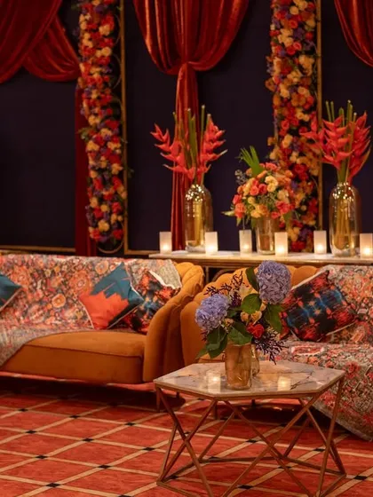 A closer view of the lounge seating, showing the mix of patterned and colorful cushions that added personality to the space.