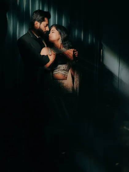 I love playing with light and shadows to create something dramatic and intimate. This portrait is all about the quiet intensity and the deep connection between two people.