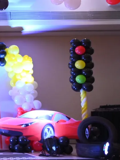 Another angle of the impressive Ferrari car prop, perfectly positioned in front of the main stage for maximum impact.
