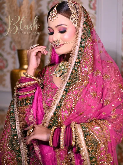 This image showcases the beautiful draping of the dupatta and how the makeup ties the entire look together. The focus is on creating a radiant and cohesive bridal appearance.