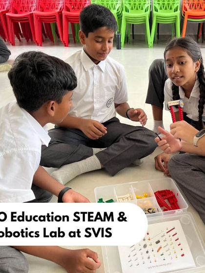 Students at SVIS discuss their LEGO mechanism. This kind of peer-to-peer teaching and collaboration is a powerful way to solidify learning and build communication skills.