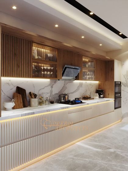 A modern galley kitchen that maximizes space and style. The design features fluted white base cabinets and wood-finished upper cabinets, with a striking marble backsplash and integrated lighting.
