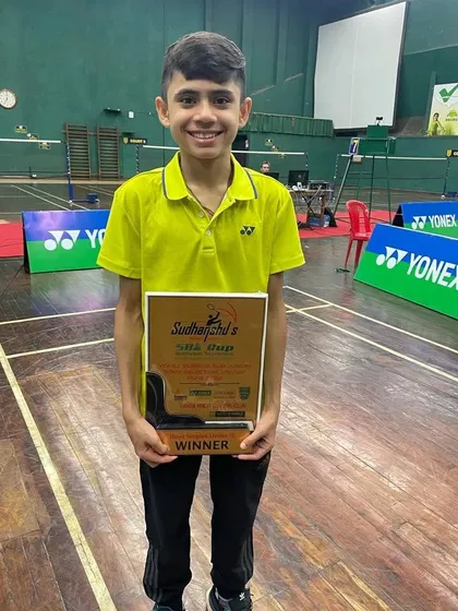 A clear shot of Dev with his winner's trophy at the state selection tournament in Pune, a major achievement for any sub-junior player.