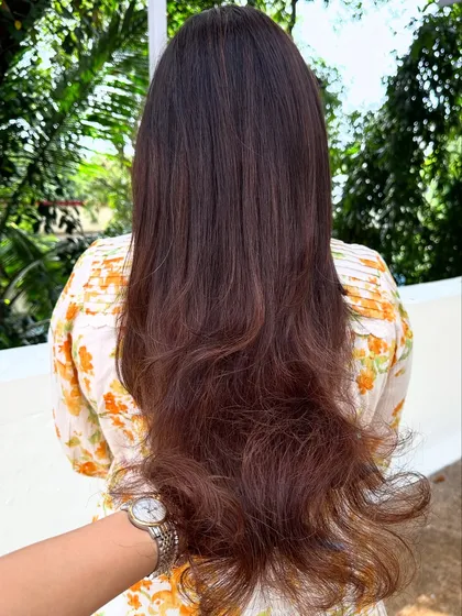 Are you even birthday ready if your hair ain’t done? This transformation involved covering significant grey regrowth and blending it into a rich, youthful brunette color with a fresh cut.