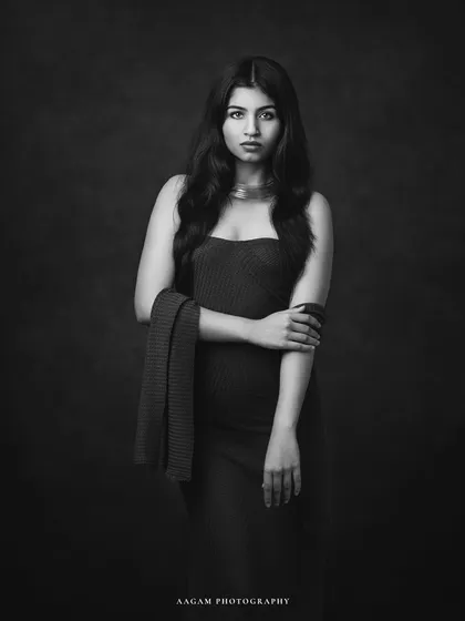 The art of stillness. This black and white portrait is strong and direct, focusing on the subject's powerful presence and gaze.
