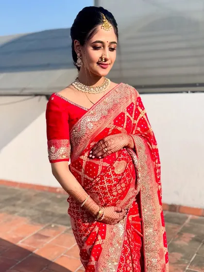 The beautiful mommy-to-be, glowing for her Godh Bharai (baby shower). We created a soft, radiant look to celebrate this special milestone, ensuring she felt comfortable and beautiful all day.