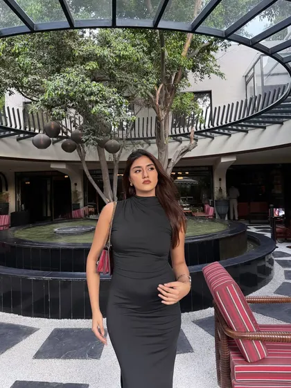 A wider shot of the dress, capturing the beautiful architecture.
