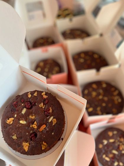 My individual Christmas plum cakes, packed and ready to go. Each cake is loaded with fruits and nuts, making it a perfect little holiday treat to gift or enjoy yourself.