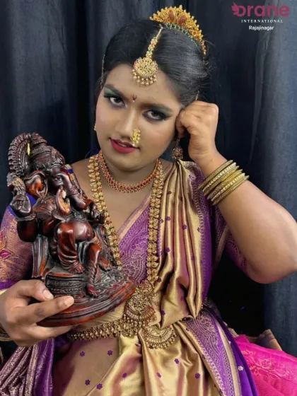 A student's creative interpretation of a festive look for Ganesh Chaturthi, combining traditional attire with artistic makeup.