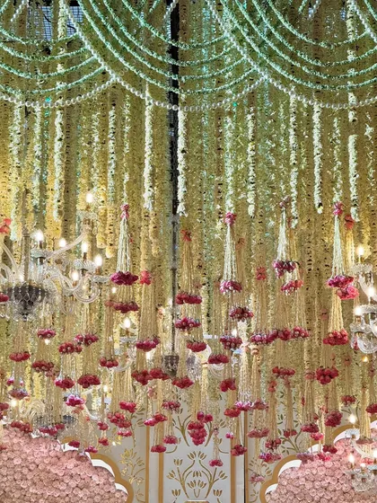Various angles of the pastel mandap, showcasing the expanse of blooms, the custom seating, the floral aisle, and the intricate details that made this a truly wholesome and majestic celebration.