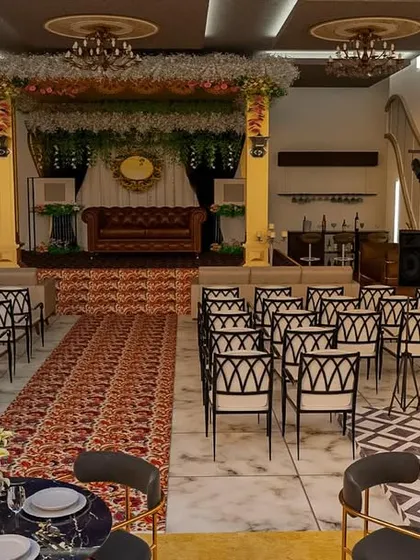 We design event venues that leave a lasting impression. This is a 3D visualization of a marriage hall masterpiece, featuring a grand stage, elegant seating arrangements for hundreds of guests, and a dedicated DJ console, all planned to ensure a seamless and luxurious event experience.