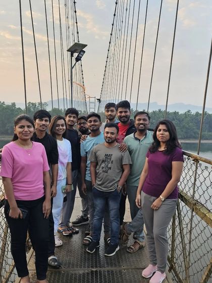 A group photo on the iconic suspension bridge in Honnavar.