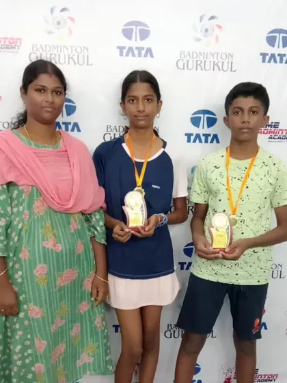 A family poses with their children who are winners at the intra-academy tournament. Our events are family-friendly affairs.