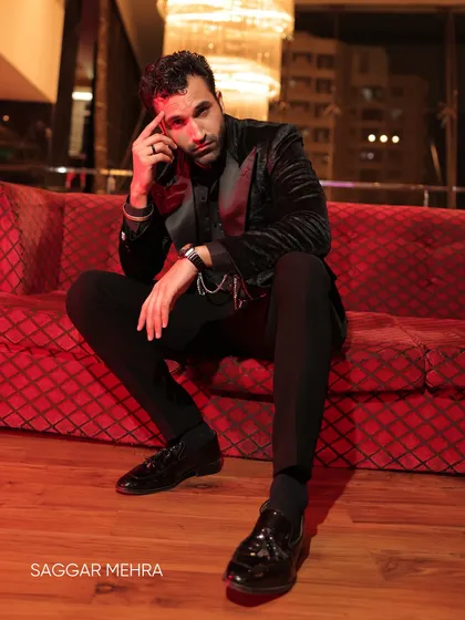 Gurfateh Pirzada in my black textured velvet coat. This look is all about creating a dark, romantic mood, with the rich velvet and satin lapels adding depth and luxury.