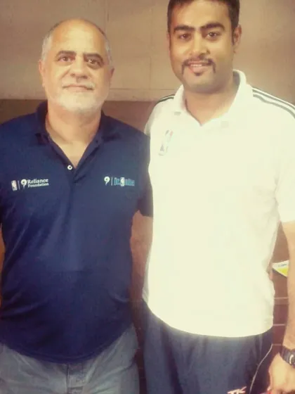 A picture with a member of Mr. Carlos Barroca's team. Building a strong professional network is key to providing the best opportunities and exposure for our players.