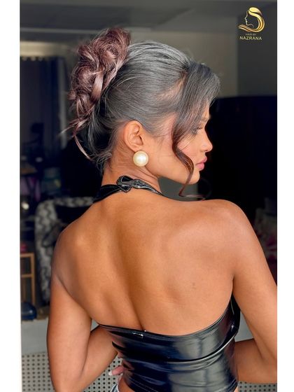 A back view of the textured French twist, showing the intricate detail.