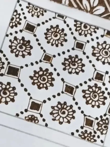A duplicate image of a geometric filler pattern with spiral flowers, great for practice.