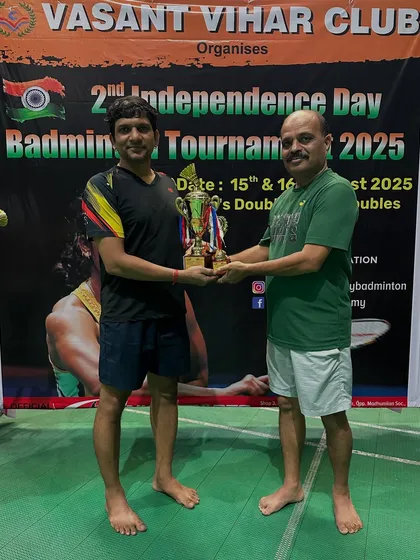 Another B Group Men's Doubles runner-up, Jitu, being recognized for a great tournament.