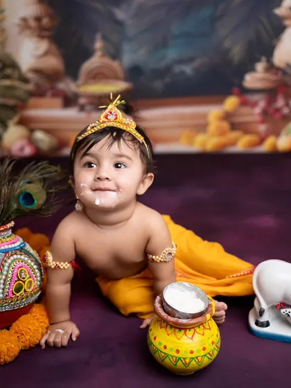 Capturing the playful spirit of little Krishna is always a joy. This Janmashtami theme, complete with a pot of maakhan, is one of the most requested cultural shoots I do.