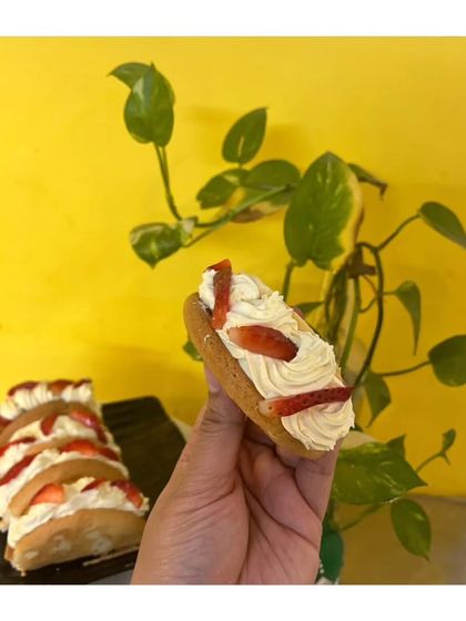 Satisfy your sweet cravings with this tantalizing taco-shaped strawberry sponge cake. It's a unique treat that's as fun to eat as it is delicious.