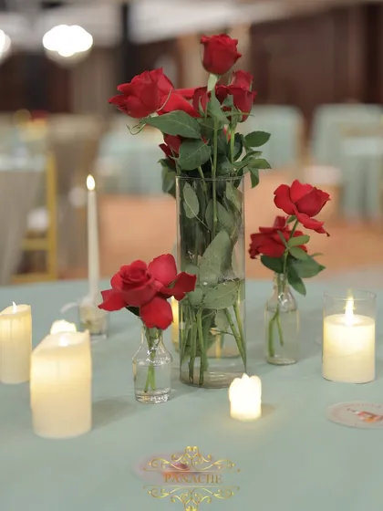 Another view of the simple yet elegant red rose and candle centerpiece.