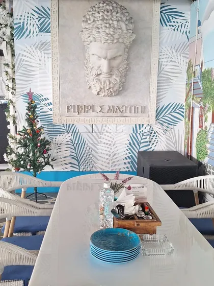 The beautiful Greek-themed interiors of Purple Martini, which transport you to a different world.