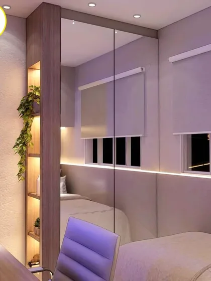 The mirrored wardrobe door reflects the room, making this compact space feel much larger and brighter.