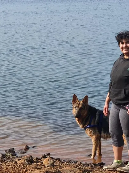 My partner and Jiraiya enjoying a moment by the water's edge. Our trips are all about finding these simple, shared experiences in beautiful places.