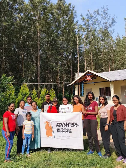 The group in front of their homestay, ready for another day of exploration.