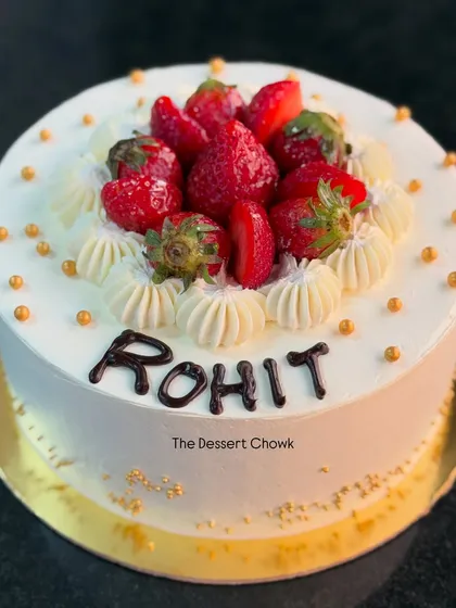 A classic strawberry fresh cream cake. The light vanilla sponge is layered with fresh cream and topped with sweet, juicy strawberries.