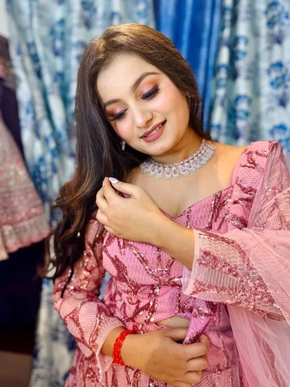 A closer look at the pretty pink sequin lehenga. The fabric has a beautiful shine, and the fit is designed to be flattering.