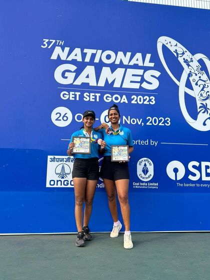 Soha and her partner with their bronze medals at the 37th National Games, a testament to their excellent teamwork and performance.