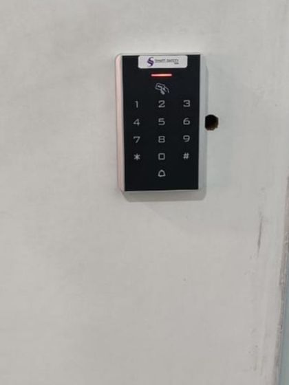 This is a low-budget RFID and keypad reader, perfect for small organizations needing a simple door access solution.