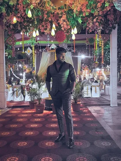 Taking a moment to appreciate the festive and colorful decor at a wedding celebration.