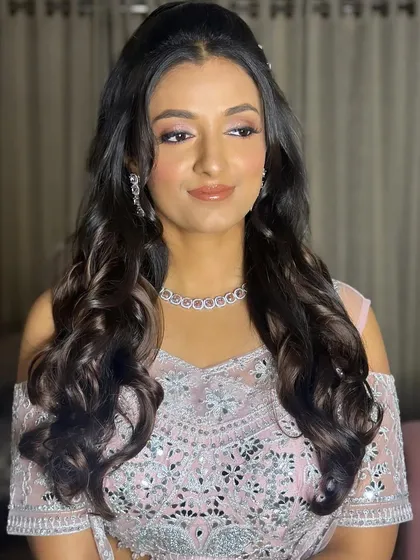 A full-face view of Pooja's sangeet glam. The look is ethereal and perfect for an evening of dance and celebration.