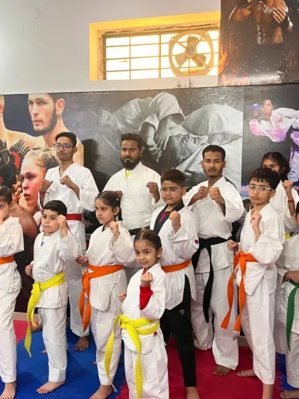 A group of our students, from white to black belts, training together. The dojo is a place where everyone learns from each other.