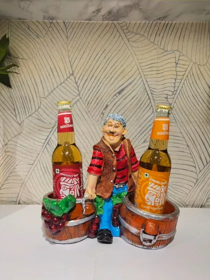 My quirky bottle holders are a great gift for him. This one features a cheerful man ready to serve two of your favorite drinks.