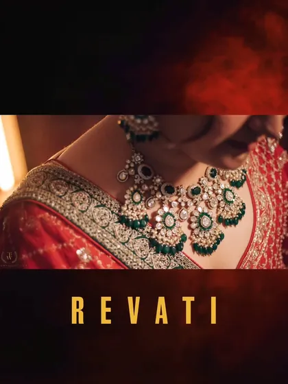 A close-up showcasing the magnificent bridal necklace against the rich fabric of the lehenga. We ensure every detail of the bridal jewelry is captured beautifully.